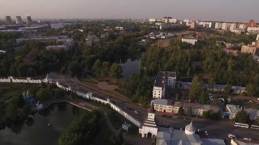 Drone flying forward over Dzerzhinsky pond