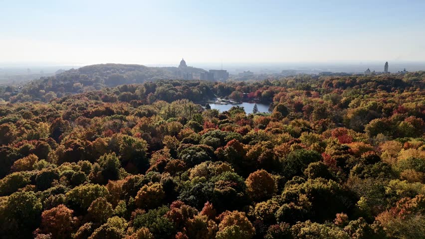 Aerial view of Mount Royal Park and downtown Montreal during vibrant autumn foliage, Quebec, Canada. g.