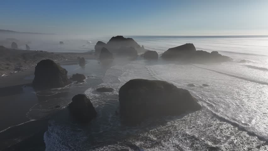 natural scenery of waves crashing against rocks Pacific coast of Oregon, USA