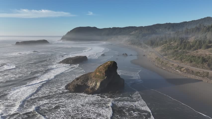 natural scenery of waves crashing against rocks Pacific coast of Oregon, USA