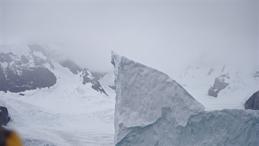 Iceberg Peak with Visible Vertical Crack