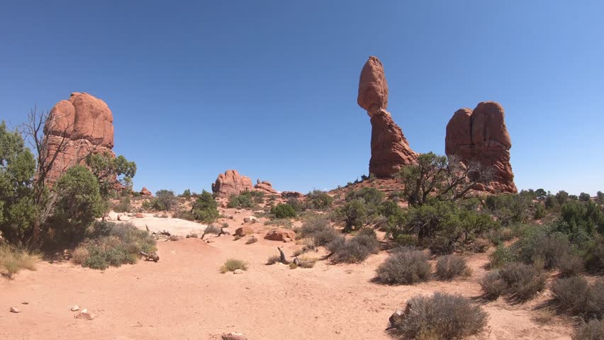 Cinematic views of red rock formations in Arches National Park Utah with smooth motion travel footage