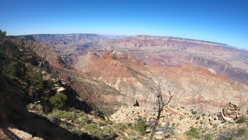 Travel footage of panoramic scenery in the Grand Canyon during clear weather