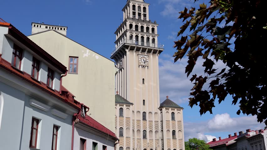 Bell tower of Saint Nicholas Cathedral in historic part of Bielsko-Biala city, Poland, 4k