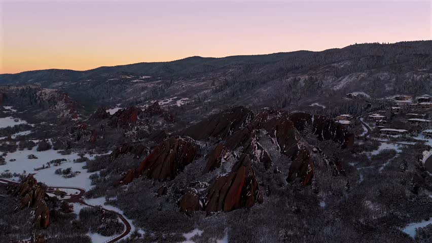 Snow-covered Roxborough State Park Red Rocks jagged sandstone Sterling Ranch Colorado aerial drone landscape Littleton Fountain Valley Trail sunset Denver Front Range Rocky Mountains circle backwards