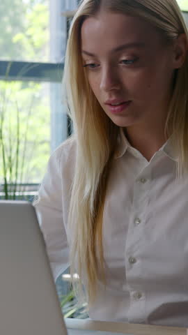 Happy smiling friendly Caucasian businesswoman talking video call greeting hello showing thumb up business woman female girl talk conference laptop virtual chat smile communicate speak at office table