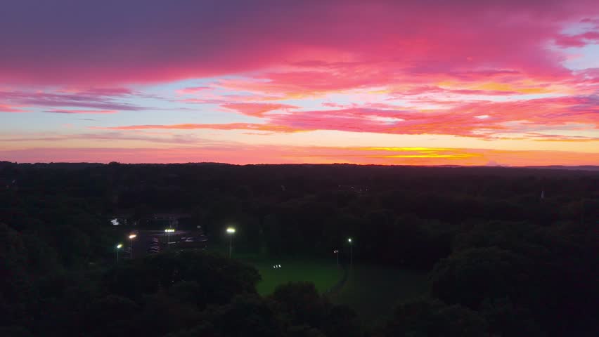 Summer aerial view featuring the Wethersfield, Connecticut sunset above Mill Woods Park
