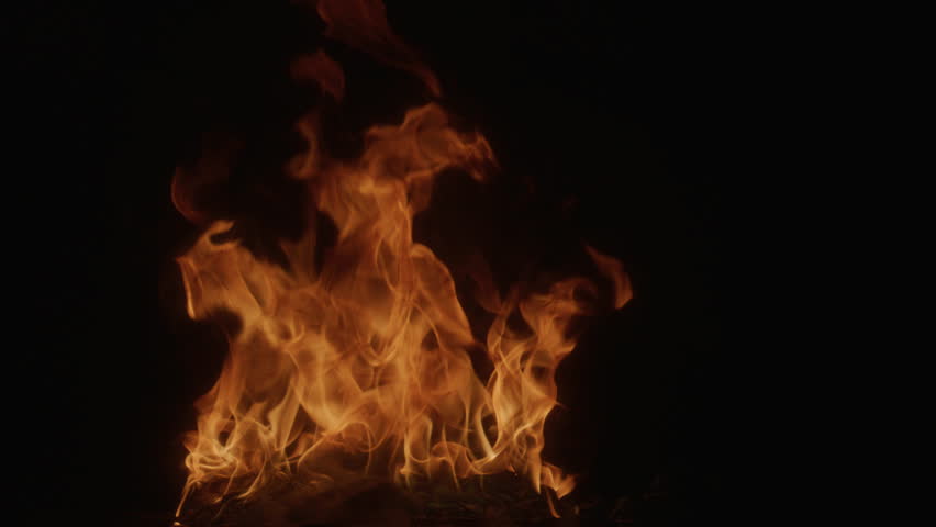 Fire with flame. Intense burning fire texture for overlay layer effects. Fiery explosion background. Flame pattern. Flames on black slow motion. Glowing flames on black slow motion.