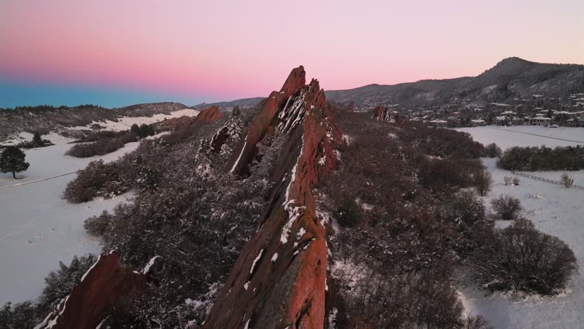 Spring Winter snow-covered jagged red rocks sandstone aerial drone Roxborough State Park Fountain Valley Trail landscape Denver Littleton Sterling Ranch Colorado Front Range Rocky Mountains forward up