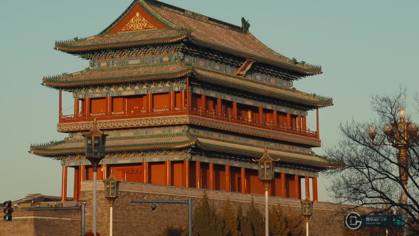 Beijing Zhengyangmen Qianmen Gate Tower in Golden Hour Light with Red Imperial Architecture and Triple Roof
