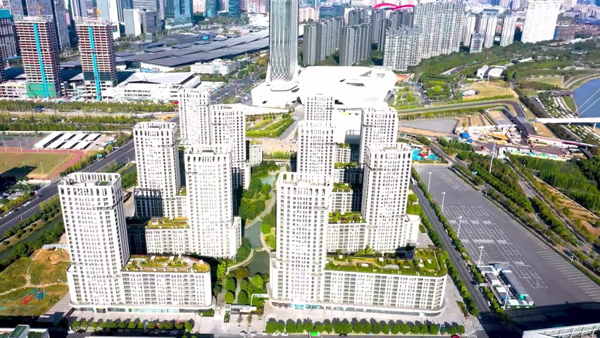 Drone aerial view of modern high-rise residential buildings and the iconic city skyline in Nanjing China for an urban development concept
