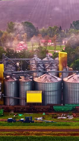 Vertical social ratio aerial video of a production site on a sunny day. Produced with Rec709 color.