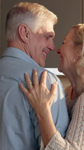 Dancing, laugh and senior couple in kitchen for bonding, relationship and connection in home. Marriage, happy and elderly man and woman with music, movement and embrace for affection, trust and love