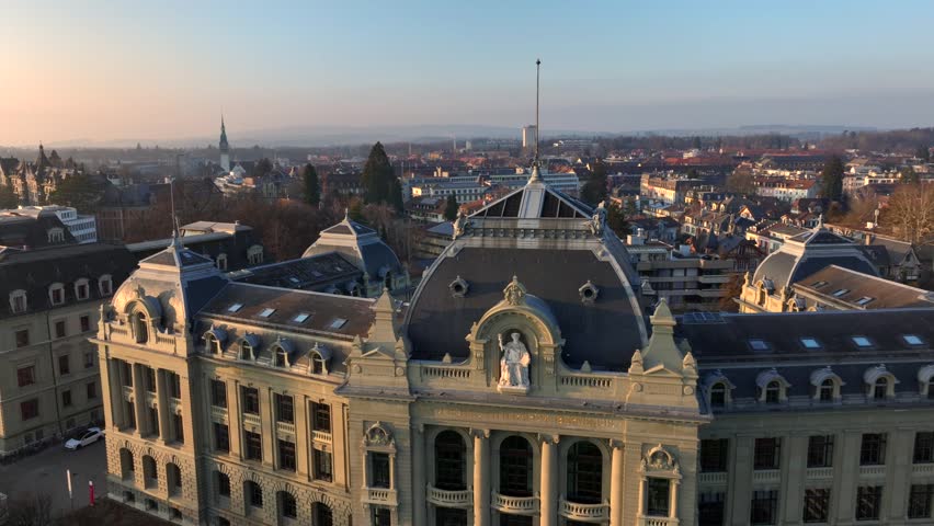 Bern, The Capital of Switzerland from above in Evening Sunset Light at Winter. Aerial Drone shot.