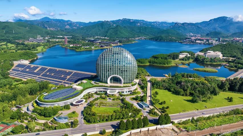 Beijing, China - 25th August 2023 - Sustainable Grandeur: Panoramic Summer Landscape of Beijing Yanqi Lake with Rolling Mountains and Eco-Greenery
