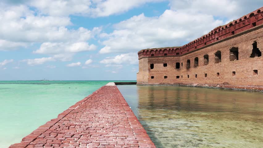 Fort Jefferson and Gulf waters on a partly cloudy day in Dry Tortugas National Park, Florida.
