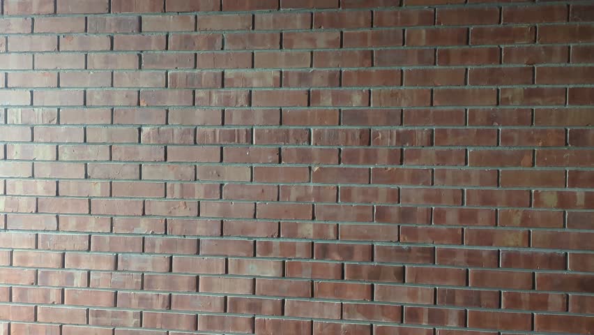 Discover the timeless charm of a classic red brick wall. Perfect for adding a rustic, urban vibe or textured backdrop to your creative projects. A clean, high-quality shot of structural beauty.