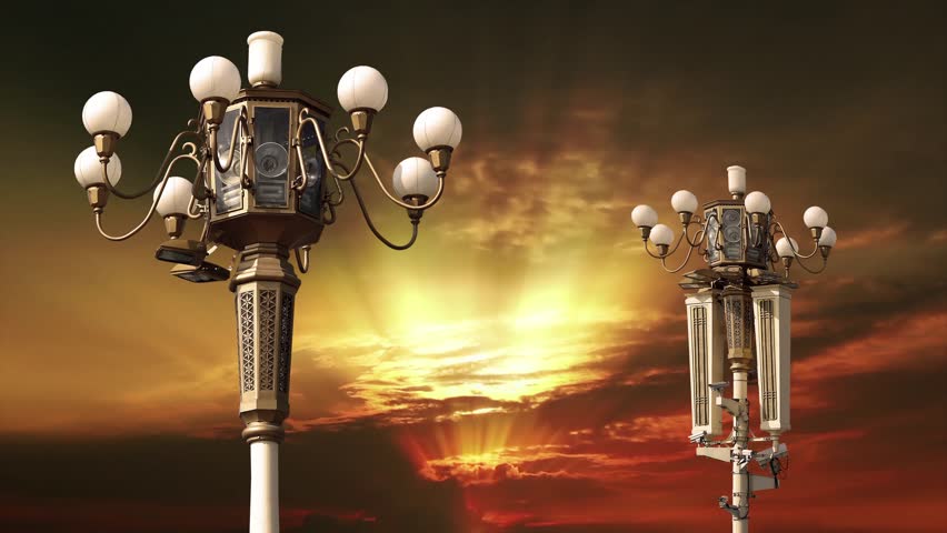 Street lamp on Tiananmen Square in Beijing, China (against the sunset), with propaganda or public announcement speakers. 4K, time lapse, with zoom 