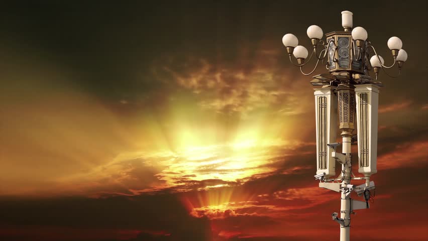 Street lamp on Tiananmen Square in Beijing, China (against the sunset), with propaganda or public announcement speakers. 4K, time lapse, with zoom 