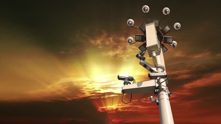 Street lamp on Tiananmen Square in Beijing, China (against the sunset), with propaganda or public announcement speakers. 4K, time lapse, with zoom 