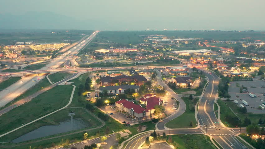 Hyperlapse Drone shot of boulder Colorado at night showing highways and the city