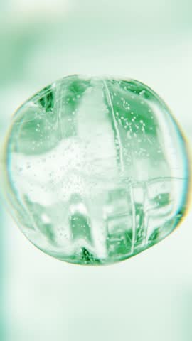 Green aloe vera serum bubble. Organic eco skincare cosmetics macro 3D abstract background. Natural moisturizer essence gel drops. Collagen fluid molecule, detox peptide face lotion for skin renewal
