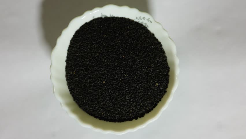 sabja seeds close up view highlighting healthy edible basil seed texture