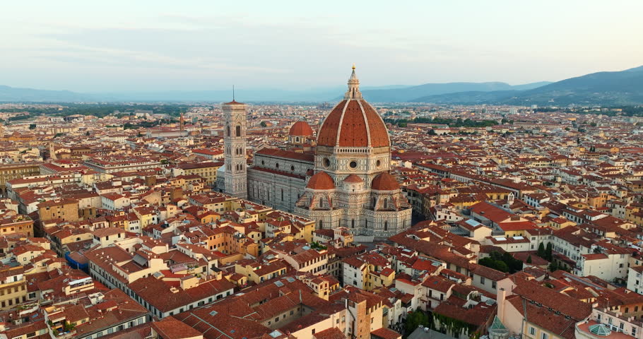 Florence Cathedral Santa Maria del Fiore Duomo Brunelleschi dome aerial rooftops Tuscany Italy slow motion travel landmark architecture Renaissance tourism heritage cityscape