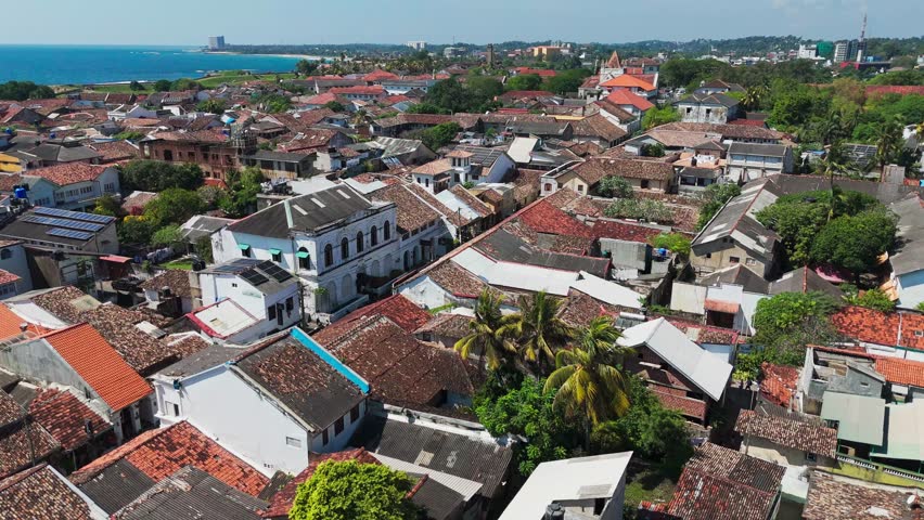 Sri Lanka - 05 05 2024: Aerial drone flight over ancient historic buildings in Sri Lanka, showcasing traditional architecture and cultural heritage site from above.
