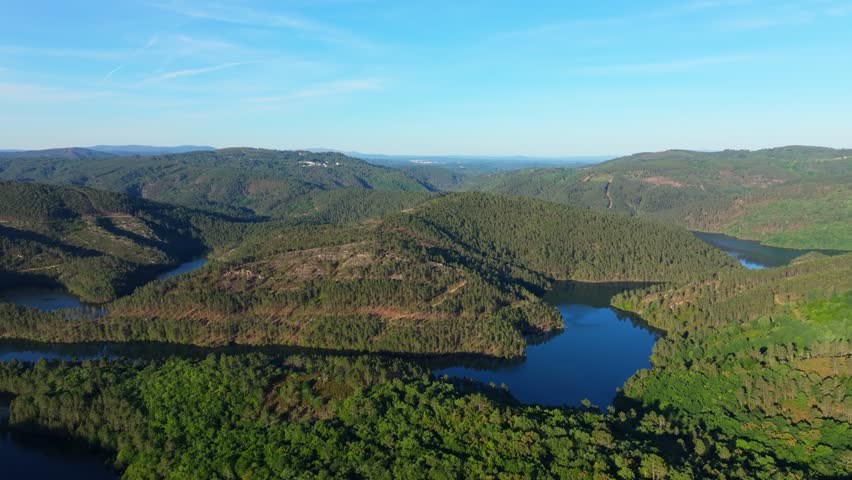 Avia River Through Lush Green Valley From Mirador de San Vicente In Avión, Ourense Province Of Galicia, Spain. Aerial Drone Shot
