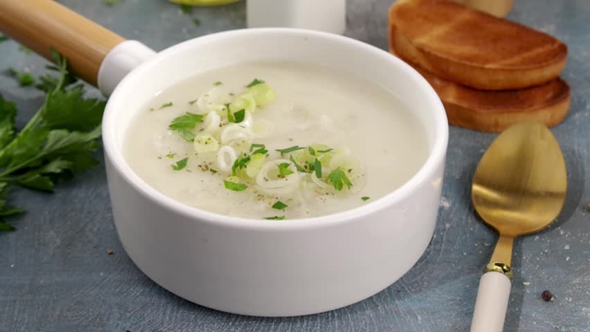 Homemade tasty leek and potato Cream Soup. Healthy simple vegan food recipe, with leek and potato creamy puree, Comfort Meal, Vegetarian Food concept