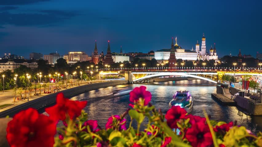 Evening view of the Moscow River, the Kremlin, the Cathedral of St. Michael the Archangel, and the Grand Kremlin Palace - timelapse