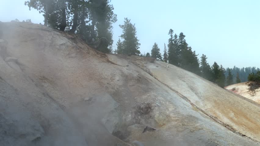 Boiling Mudpots At Sulphur Works Geothermal Area Within Lassen Volcanic National Park In California. - tilt down shot