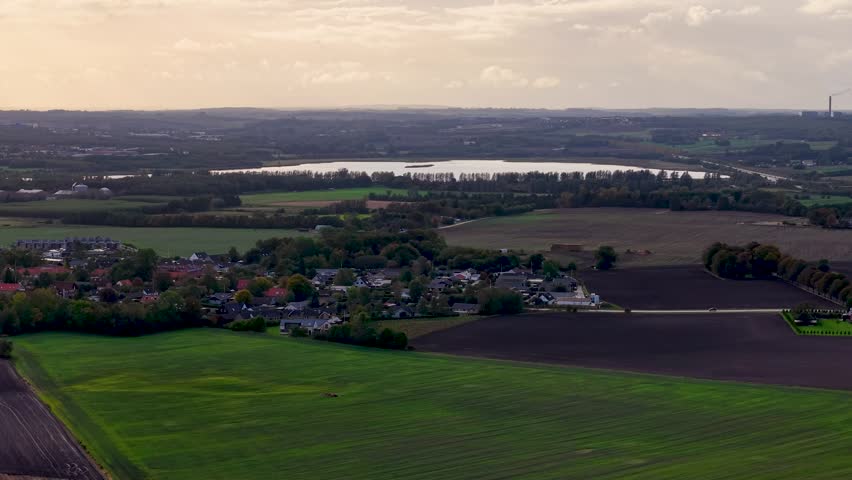 Northern countryside with low tide and farmland, possibly Jutland region, Denmark