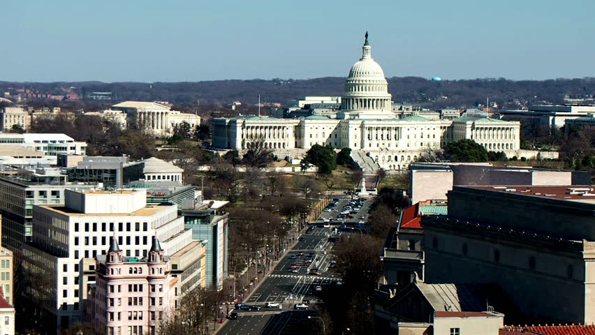 Capitol Building in Washington DC United States with main street cars and pedestrian way streets 4k timelapese high speed