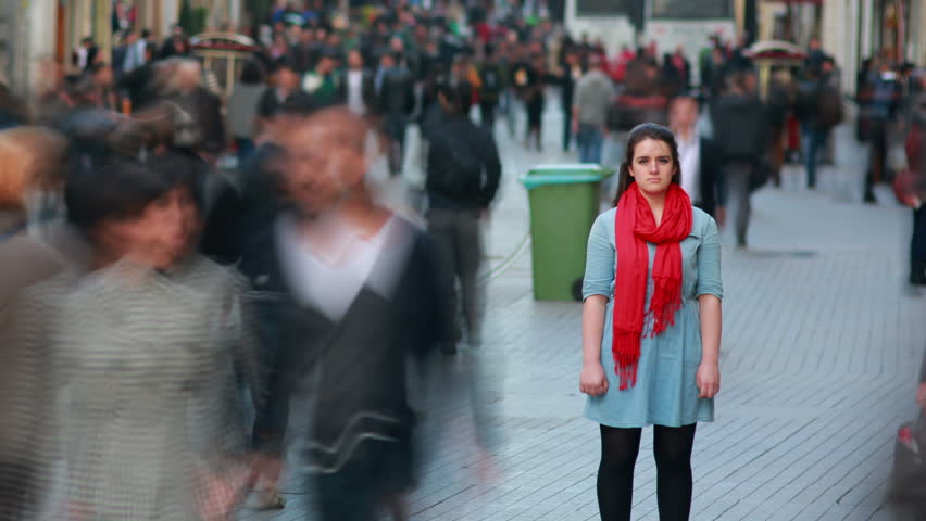 Young Woman Standing In Busy City Street Fast Motion Time Lapse