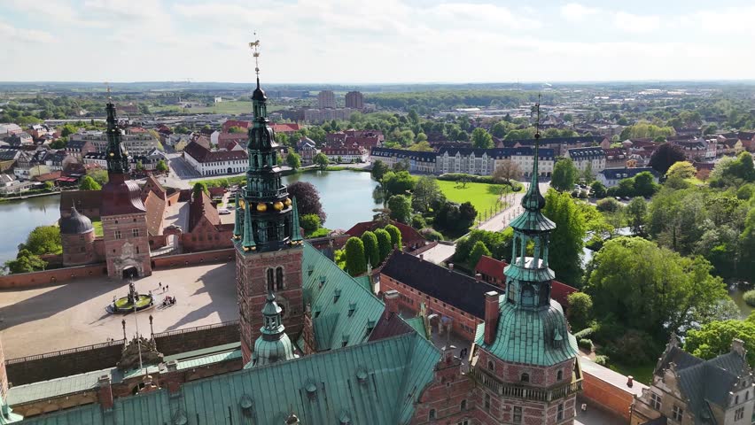 Drone shot of Frederiksborg Castle towers and courtyard, Hillerod, Denmark