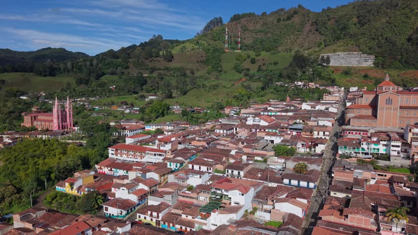 Aerial view of Jerico, Colombia with colorful buildings and lush green hillsides