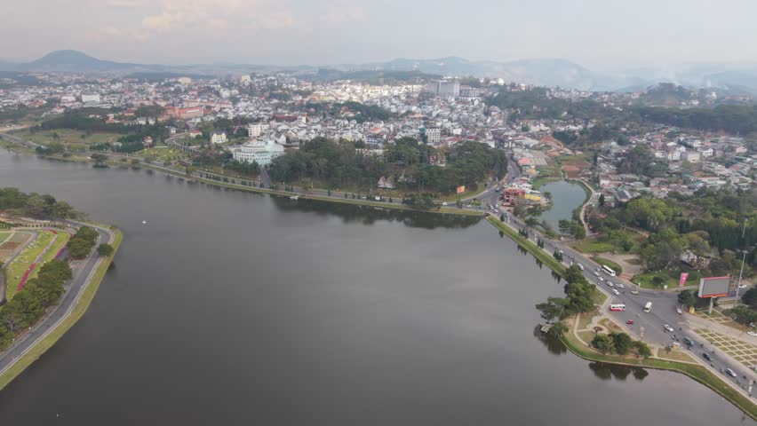 Vietnam, Da Lat Silent Mountain Reflections. Serene Mountain City Reflections And Peaceful Lake Scenery From Above. Tranquil Drone Shot Capturing Peaceful Lakeside Mountain City Of Da Lat