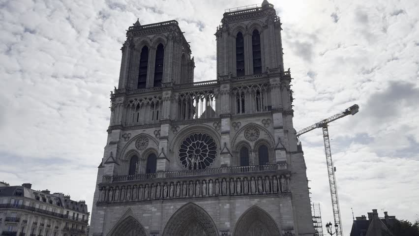 Notre-Dame Cathedral in Paris, France under spring sky