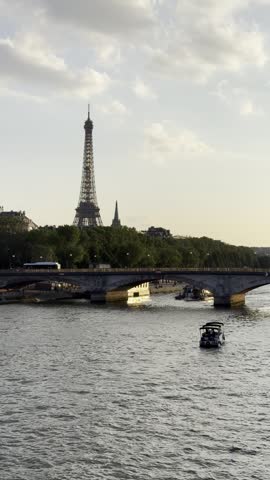 Eiffel Tower and Seine River at sunset in Paris, France
