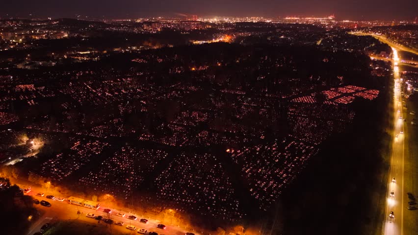 Aerial view of the Lostowicki cemetery in Gdansk at All Saints Day with thousands of candle lights, Poland