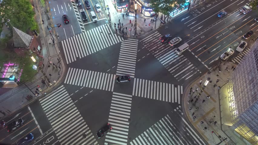 Tokyo Japan time lapse high angle view night at Ginza street crossing intersection