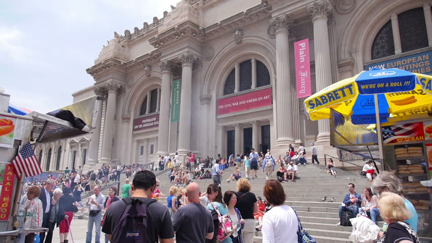 NEW YORK CITY, Circa June, 2013 - People gather around the steps of The