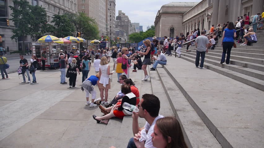 NEW YORK CITY, Circa June, 2013 - People gather around the steps of The