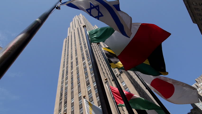 NEW YORK CITY, Circa June, 2013 - Flags fly outside Rockefeller Center in New