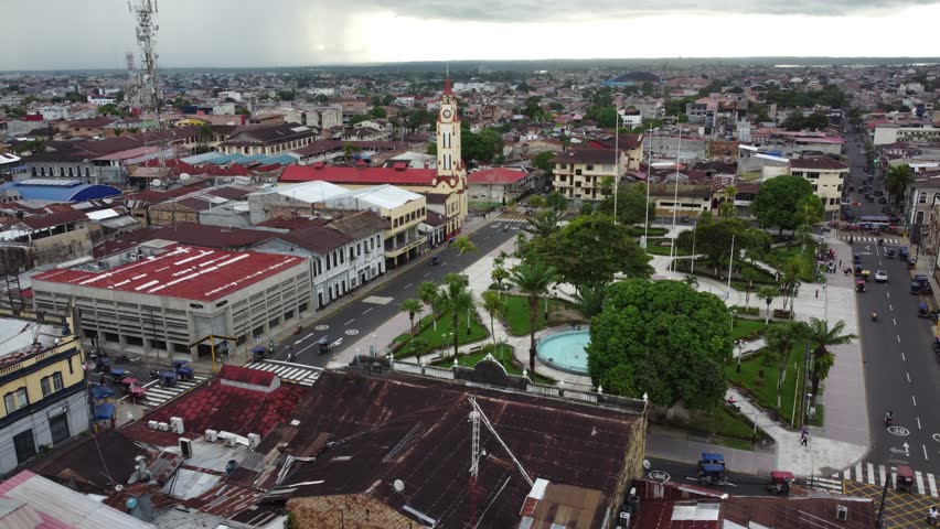 Panoramic aerial view of the plaza de armas and the cathedral in iquitos, peru, with city traffic