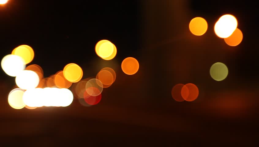 Defocused night traffic lights (HD) Night traffic lights of the big city.