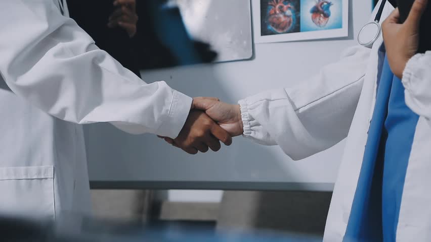 Thoughtful doctors having meeting in hospital

