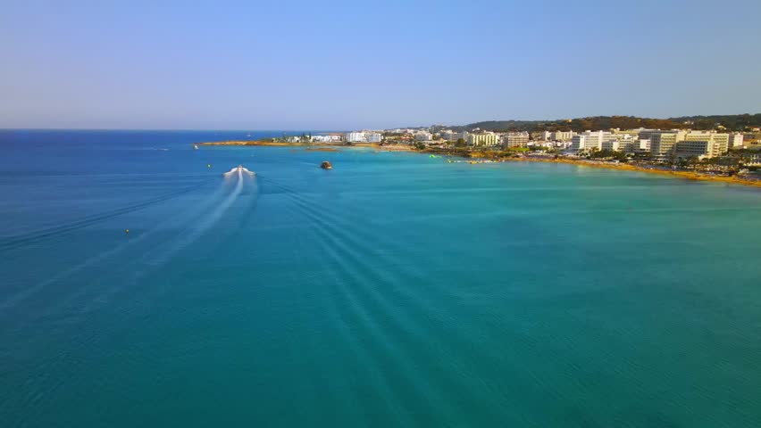 Aerial Drone View of Protaras Cyprus, Luxury Beachfront Hotels, Golden Sandy Beach and Crystal Clear Mediterranean Sea